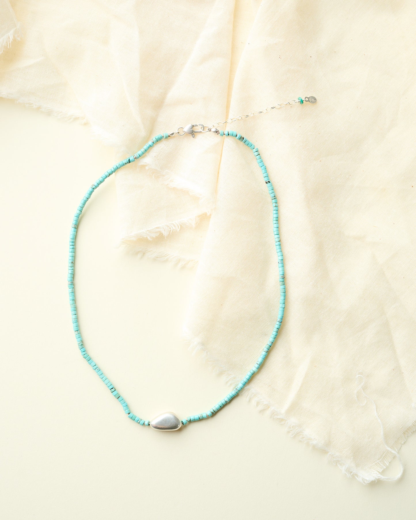 Turquoise Beaded Necklace with Silver Bean