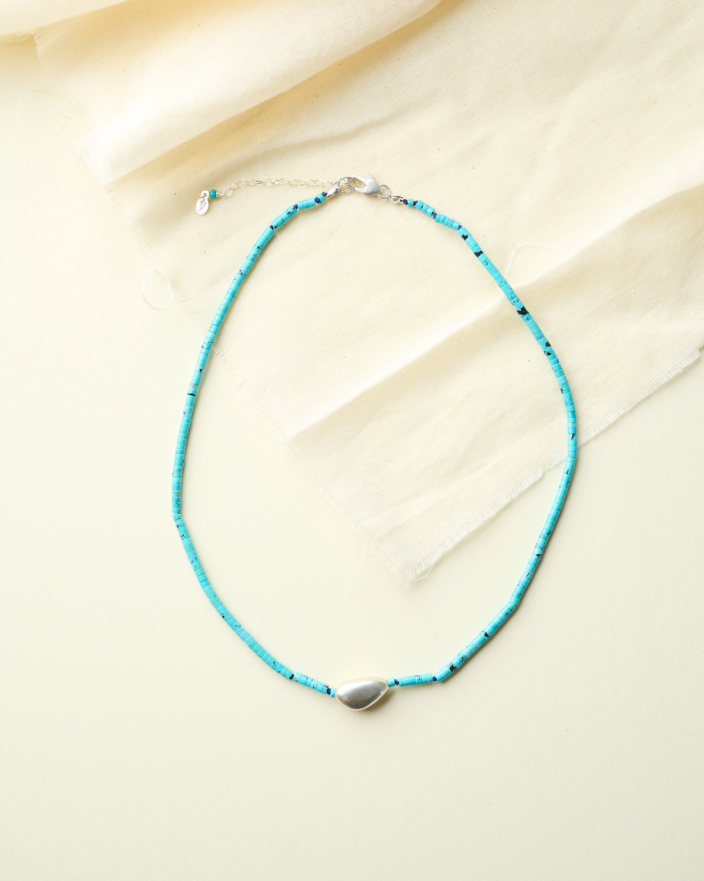 Beaded Turquoise Necklace with Silver Bean Bead