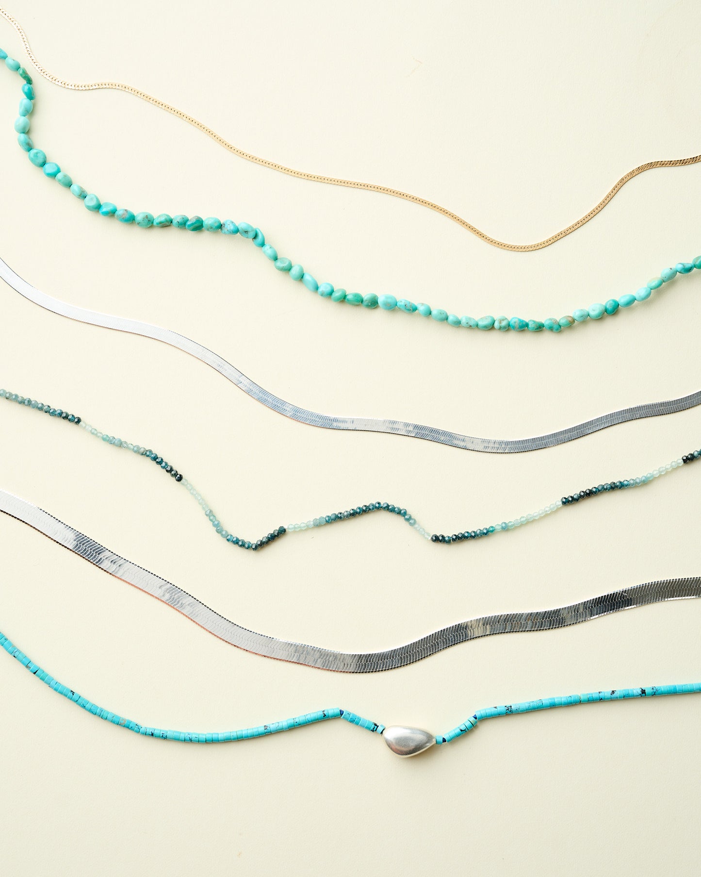 Beaded Turquoise Necklace with Silver Bean Bead
