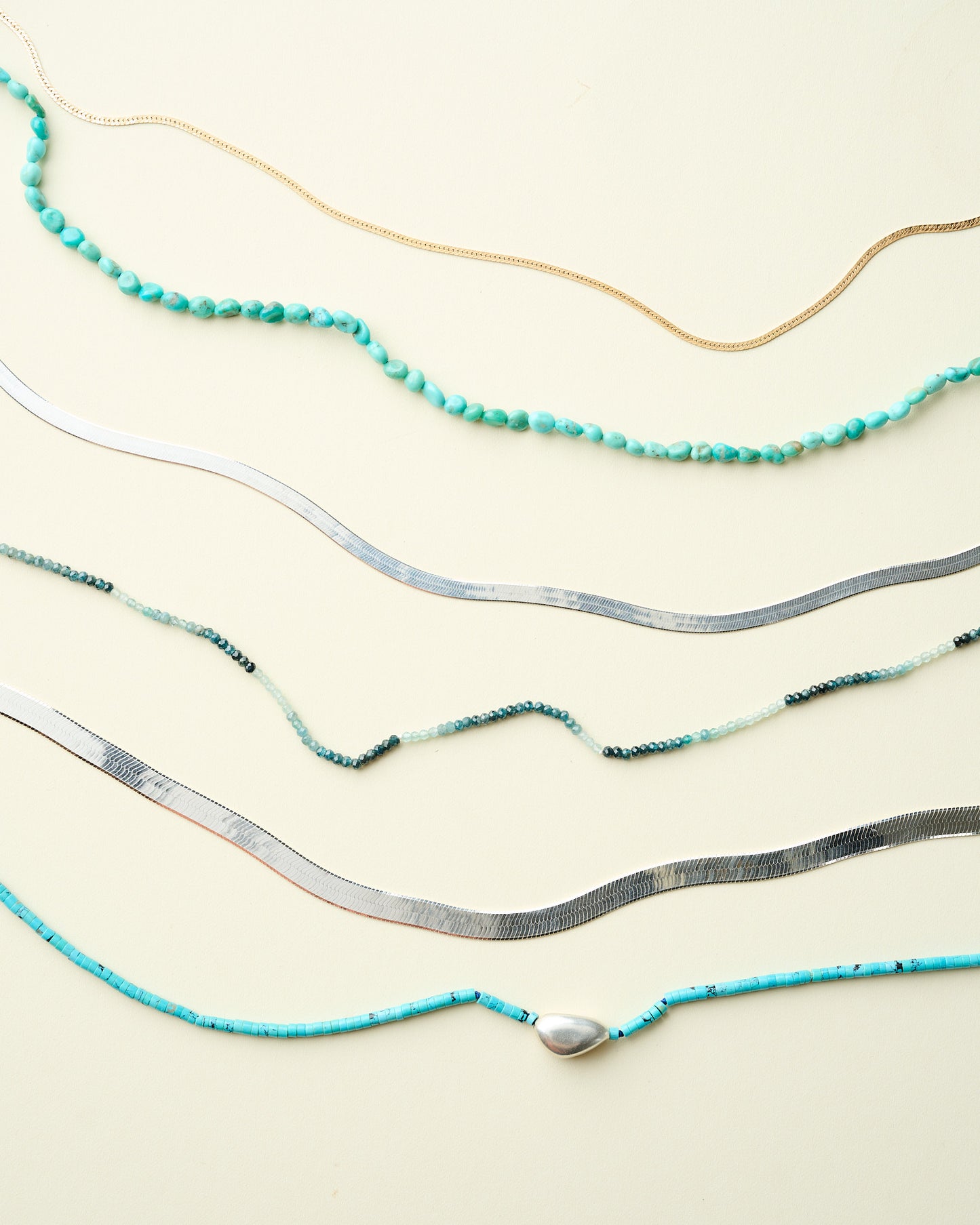 Turquoise Beaded Necklace with Silver Bean